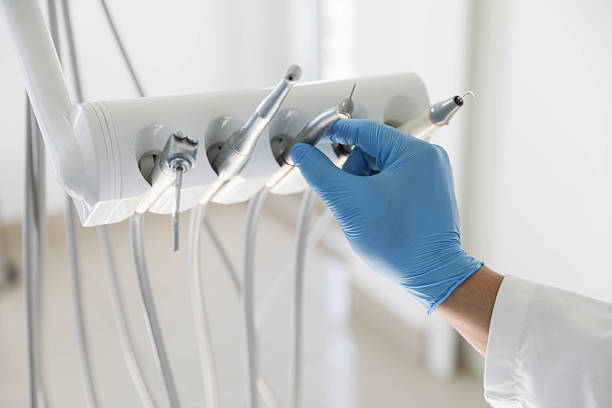 Professional Tooth Extraction technician working in Tunica County County, MS
